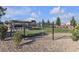 Dog park featuring a gazebo, benches, grass, and perimeter fencing at 2598 Polar White Ave, North Las Vegas, NV 89086