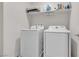 Modern laundry room equipped with new washer and dryer for convenient home care at 2598 Polar White Ave, North Las Vegas, NV 89086