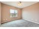 This bedroom has new carpet, neutral paint, and a window with a view at 2784 Cherrydale Falls Dr, Henderson, NV 89052