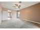 A bedroom with carpet and view of a bathroom at 2784 Cherrydale Falls Dr, Henderson, NV 89052