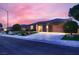 Charming home featuring manicured landscaping, a tile roof, and a spacious three-car garage at 2784 Cherrydale Falls Dr, Henderson, NV 89052
