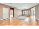 Spacious living room with hardwood floors and neutral paint with lots of natural light at 2784 Cherrydale Falls Dr, Henderson, NV 89052