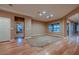 Bright living room with hardwood floors, recessed lighting, and large windows at 2784 Cherrydale Falls Dr, Henderson, NV 89052