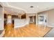 Open concept living room with hardwood floors and access to the backyard at 2784 Cherrydale Falls Dr, Henderson, NV 89052