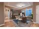Well-appointed home office featuring custom built-ins, ample desk space and a large window at 2784 Cherrydale Falls Dr, Henderson, NV 89052