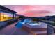 Beautiful swimming pool and spa with seating overlooking backyard views at 2784 Cherrydale Falls Dr, Henderson, NV 89052