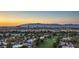 An aerial view of the Las Vegas skyline, golf course, and surrounding residential neighborhoods at 3111 Bel Air Dr # 23A, Las Vegas, NV 89109
