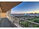 Balcony with stunning views of the city skyline, golf course, and distant mountains at 3111 Bel Air Dr # 23A, Las Vegas, NV 89109
