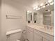 Bright bathroom featuring white cabinets, a large mirror, and a clean, well-lit space at 3111 Bel Air Dr # 23A, Las Vegas, NV 89109
