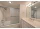 Clean bathroom with a shower-tub combo and a vanity with a large mirror at 3111 Bel Air Dr # 23A, Las Vegas, NV 89109