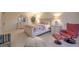 Spacious bedroom features a large bed, sitting area, and dresser with vanity mirror at 3111 Bel Air Dr # 23A, Las Vegas, NV 89109
