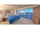 The bedroom features a stunning view of the city skyline through large sliding glass doors at 3111 Bel Air Dr # 23A, Las Vegas, NV 89109