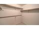 Walk-in closet with ample shelving and hanging space for storage and organization at 3111 Bel Air Dr # 23A, Las Vegas, NV 89109