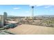 Expansive aerial view featuring the iconic Stratosphere Tower and Las Vegas skyline against a backdrop of mountains and blue skies at 322 Karen Ave # 2201, Las Vegas, NV 89109