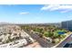 An aerial view showcasing the city, a golf course, and nearby buildings at 322 Karen Ave # 2201, Las Vegas, NV 89109