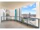 A spacious balcony with a glass railing and a view of the city and surrounding buildings at 322 Karen Ave # 2201, Las Vegas, NV 89109
