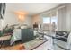 Cozy bedroom with a balcony overlooking city views, stylish furnishings, and natural light at 322 Karen Ave # 2201, Las Vegas, NV 89109