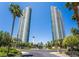 Exterior shot of the building highlighting the two towers and the perfectly manicured landscaping at 322 Karen Ave # 2201, Las Vegas, NV 89109
