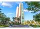 A towering high-rise condo building with balconies and lush landscaping at 322 Karen Ave # 2201, Las Vegas, NV 89109