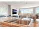 Modern kitchen with a view of the open plan living space, featuring a sink and countertops at 322 Karen Ave # 2201, Las Vegas, NV 89109