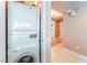 Modern laundry area with stacked washer and dryer, optimizing space and convenience at 322 Karen Ave # 2201, Las Vegas, NV 89109