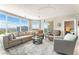 Spacious living room with floor-to-ceiling windows offering panoramic city and mountain views at 322 Karen Ave # 2201, Las Vegas, NV 89109