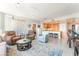 Modern living room featuring tile floors, a well appointed kitchen and comfortable seating at 322 Karen Ave # 2201, Las Vegas, NV 89109