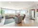 Open living room with comfortable sofa, city views, and modern decor at 322 Karen Ave # 2201, Las Vegas, NV 89109