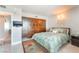 Cozy main bedroom featuring built-in wooden closet and accent rug at 322 Karen Ave # 2201, Las Vegas, NV 89109