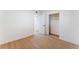 Bright bedroom featuring a closet and wood laminate flooring at 3320 Osage Ave, Las Vegas, NV 89101