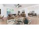 Living room showcasing modern decor, an open floor plan, and a slider to the backyard at 3320 Osage Ave, Las Vegas, NV 89101