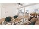Open-concept living room with stylish decor, hardwood floors, and seamlessly connected kitchen at 3320 Osage Ave, Las Vegas, NV 89101