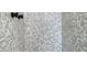 Detailed view of the modern tiled shower with black fixtures at 3320 Osage Ave, Las Vegas, NV 89101