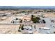 Aerial view of the property in a desert community, highlighting the land, residence, and surroundings at 3360 National Ave, Pahrump, NV 89048