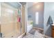 Bathroom featuring a glass enclosed shower stall and a separate tub at 3360 National Ave, Pahrump, NV 89048