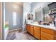 Well-lit bathroom with a white countertop vanity and tile flooring at 3360 National Ave, Pahrump, NV 89048