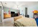 Spacious bedroom featuring a ceiling fan, and modern flooring throughout the room at 3360 National Ave, Pahrump, NV 89048