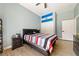 Comfortable bedroom featuring wood-look flooring and neutral wall colors at 3360 National Ave, Pahrump, NV 89048