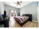 Bedroom with neutral walls and modern interior door accessing the backyard at 3360 National Ave, Pahrump, NV 89048