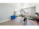 Bright home gym featuring padded flooring, mirrored wall, and weights for a complete workout space at 3360 National Ave, Pahrump, NV 89048