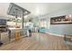 Bright and airy kitchen featuring custom cabinetry and an open layout to the living area at 3360 National Ave, Pahrump, NV 89048