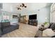 Comfortable living room setup with entertainment center and plush seating arrangement at 3360 National Ave, Pahrump, NV 89048