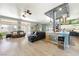 Open living area with a kitchen island and ample space for entertaining guests at 3360 National Ave, Pahrump, NV 89048