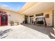 Spacious patio features a lounge swing and views of desert landscaping at 3360 National Ave, Pahrump, NV 89048