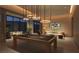 Entertainment area features a stylish pool table, comfortable seating, and a large-screen TV at 400 Rock Peak Dr # 1401, Henderson, NV 89012