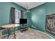 Cozy room with wood table and chairs, complemented by a wall mounted television at 4005 Poppy Fields Dr, Las Vegas, NV 89129