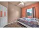 Bedroom with carpet flooring, neutral walls, and a white door at 4005 Poppy Fields Dr, Las Vegas, NV 89129