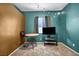 Cozy room with wood table and chairs, complemented by a wall mounted television at 4005 Poppy Fields Dr, Las Vegas, NV 89129