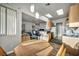 Open-concept floor plan: kitchen nook, breakfast bar, and fireplace living room offer flexibility and functionality at 4005 Poppy Fields Dr, Las Vegas, NV 89129
