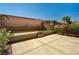 The backyard has tiered hardscape and flowering plants at 401 Sonoma Valley St, Las Vegas, NV 89144